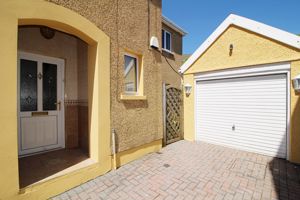 Entrance & Garage- click for photo gallery